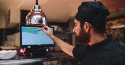 Kitchen display system showing real-time restaurant orders
