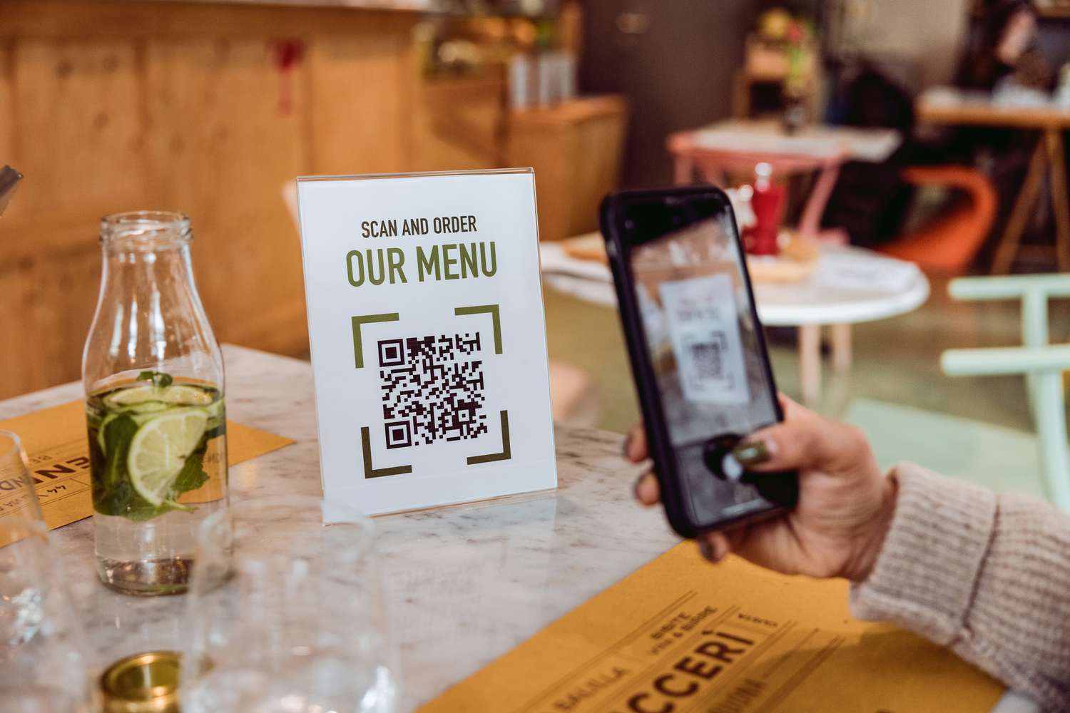 Customer scanning QR code menu